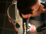 Biker gives blowjon to skin in toilets