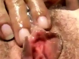 Hairy sloppy pussy cougar fingering herself