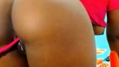 gourgeous black girl fists herself ass