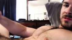 Sexy guy cums on his hairy chest