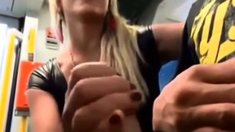 confident girlfriend gives nervous boyfriend blowjob on bus