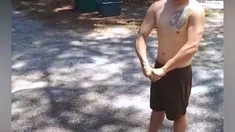 Outdoors gay hunks blow each other