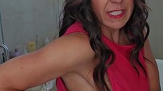 Busty curly brunette with big boobs fucks on couch