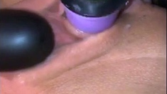 Real amateur masturbates with toy