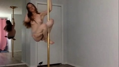 Cute Redhead Performing Topless Pole Dance
