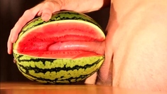 Muscular Stud Fucks And Cums On Watermelon