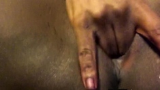 Ebony babe enjoys solo masturbation