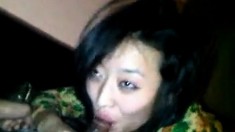 Vietnamese GF sucking on a small penis