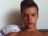 Hung twink shoots a load