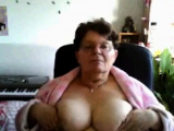 naughty granny flashing her big tits on cam