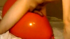 Big inflatable orange balloon humping cum